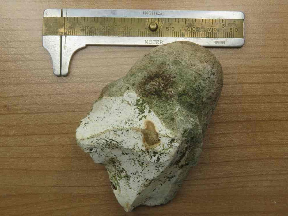 Oldowan-style handaxe: A flint nodule with removals struck to detach flakes to creat a working edge